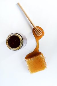 Honeycomb and honey jar