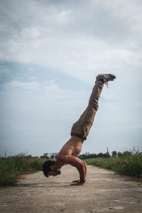 Man doing calisthenic handstand